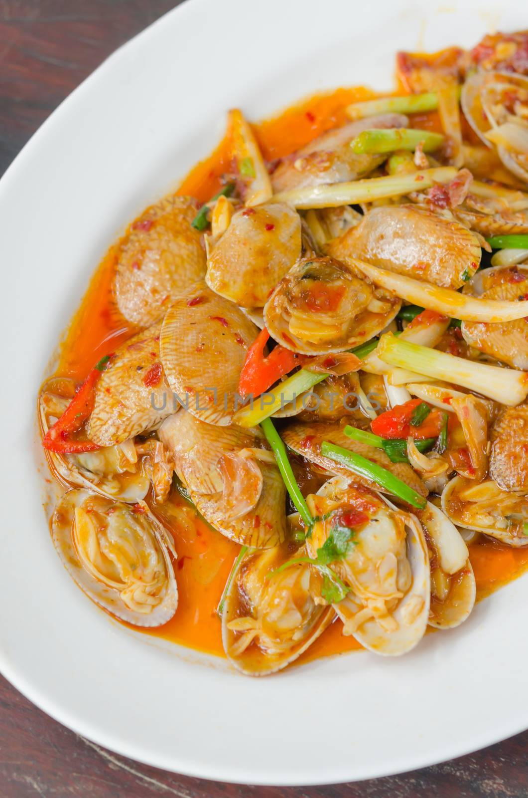 Stir fried clams with roasted chili paste and thai basil leaves