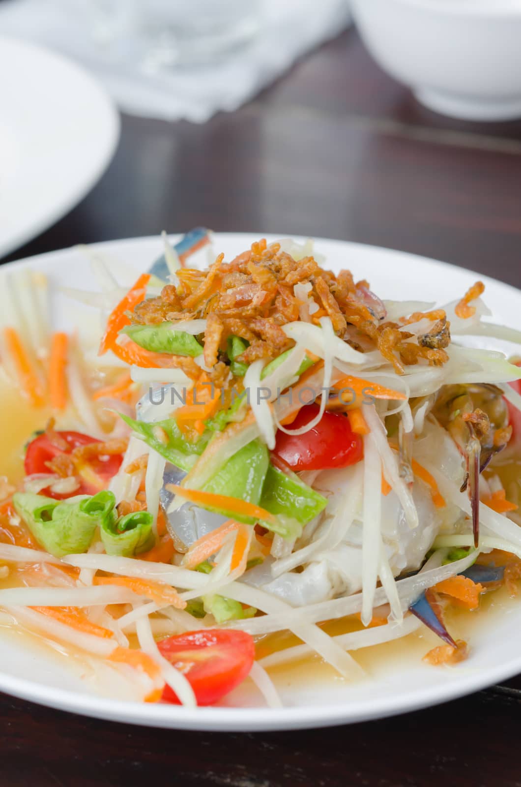 close up spicy papaya salad with crab , asian spicy food