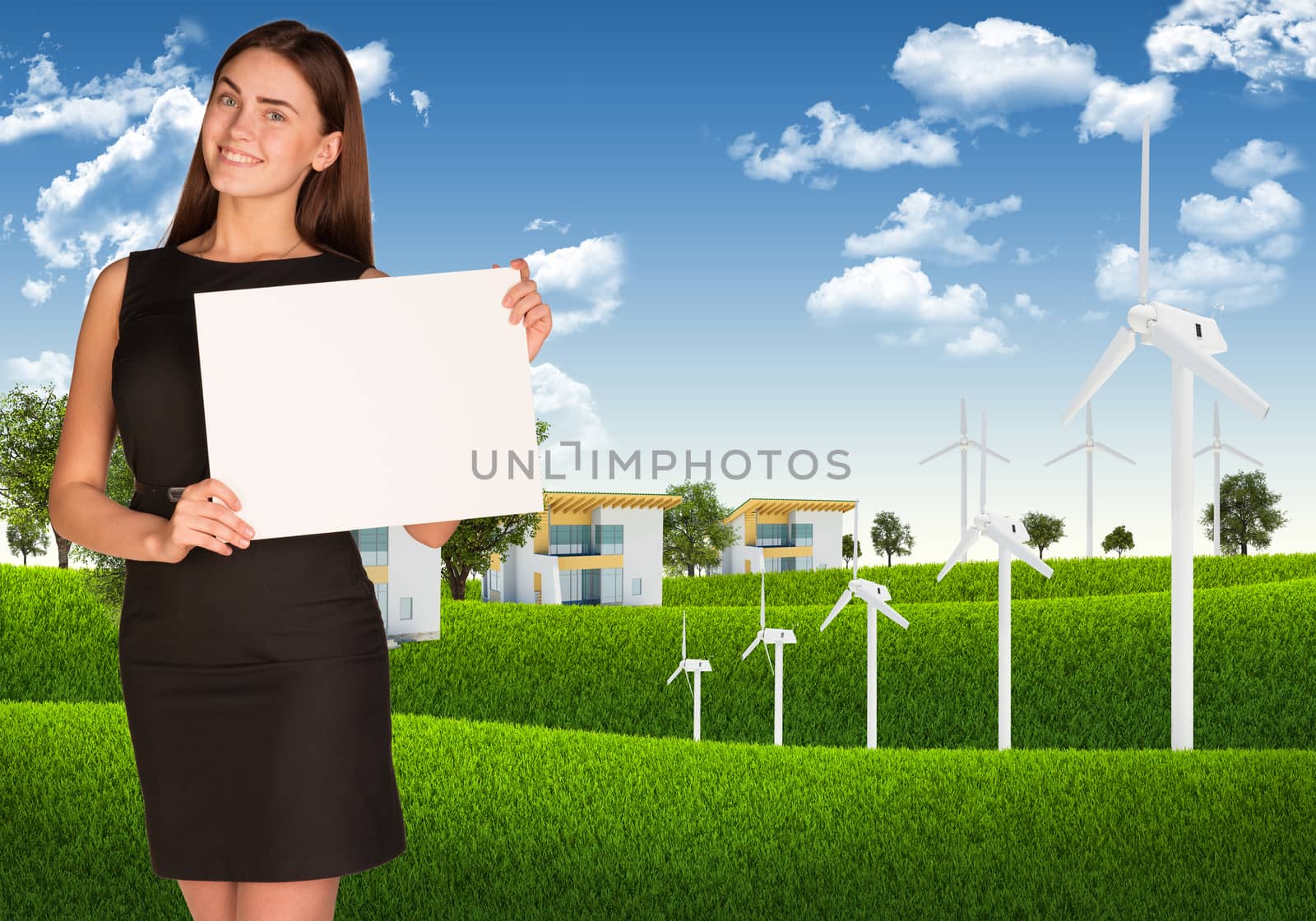 Businesswoman holding paper sheet. Blue sky, green grass and town as backdrop
