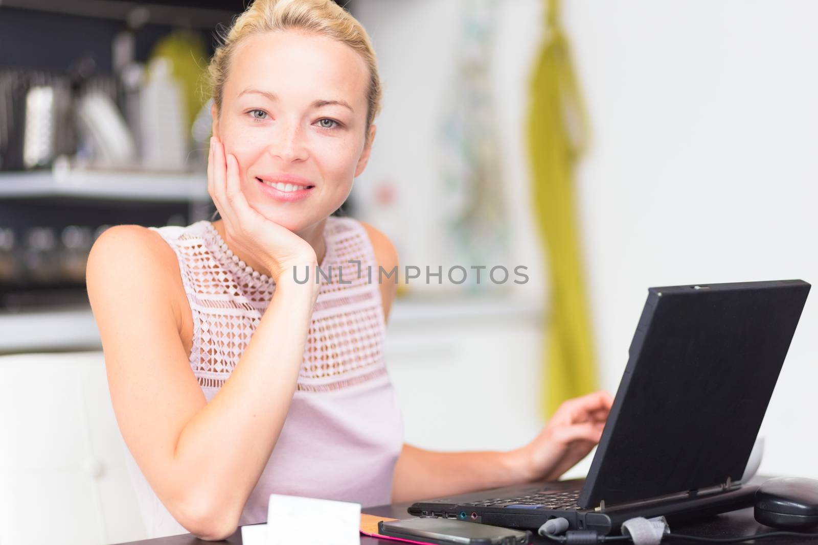 happy business woman working from her home having more time for her family.
