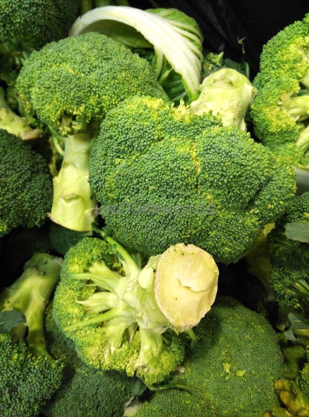 Broccoli is an edible green plant in the cabbage family by tang90246