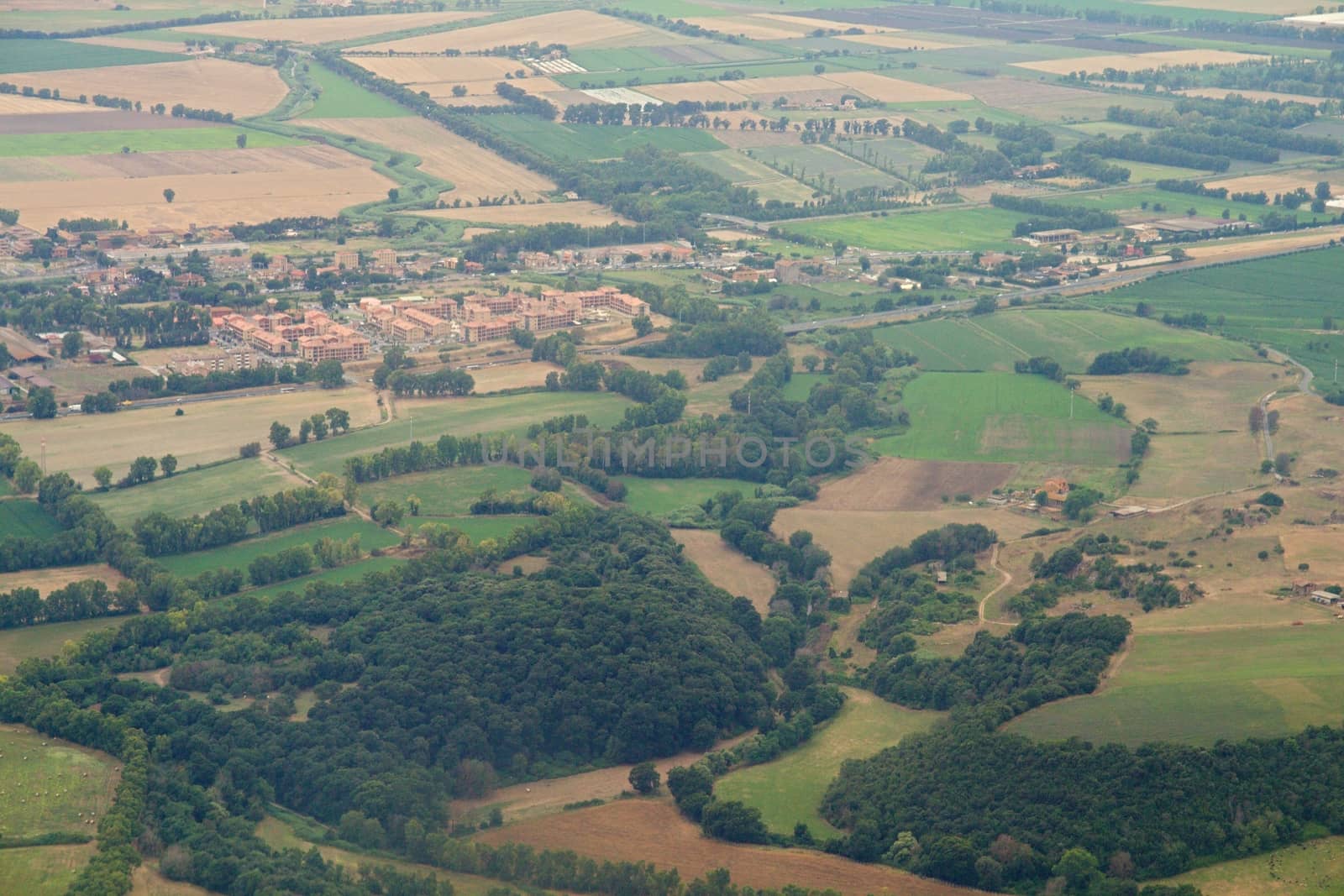 Photo shows Italian landscape taken from the plane.