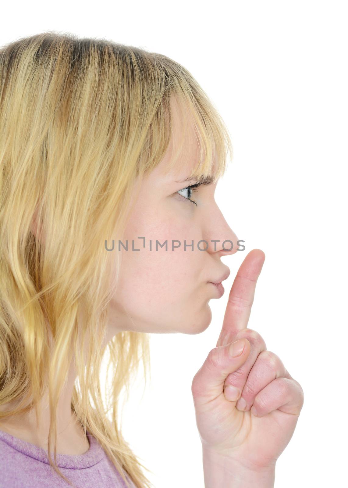 young blond woman gesturing hush
