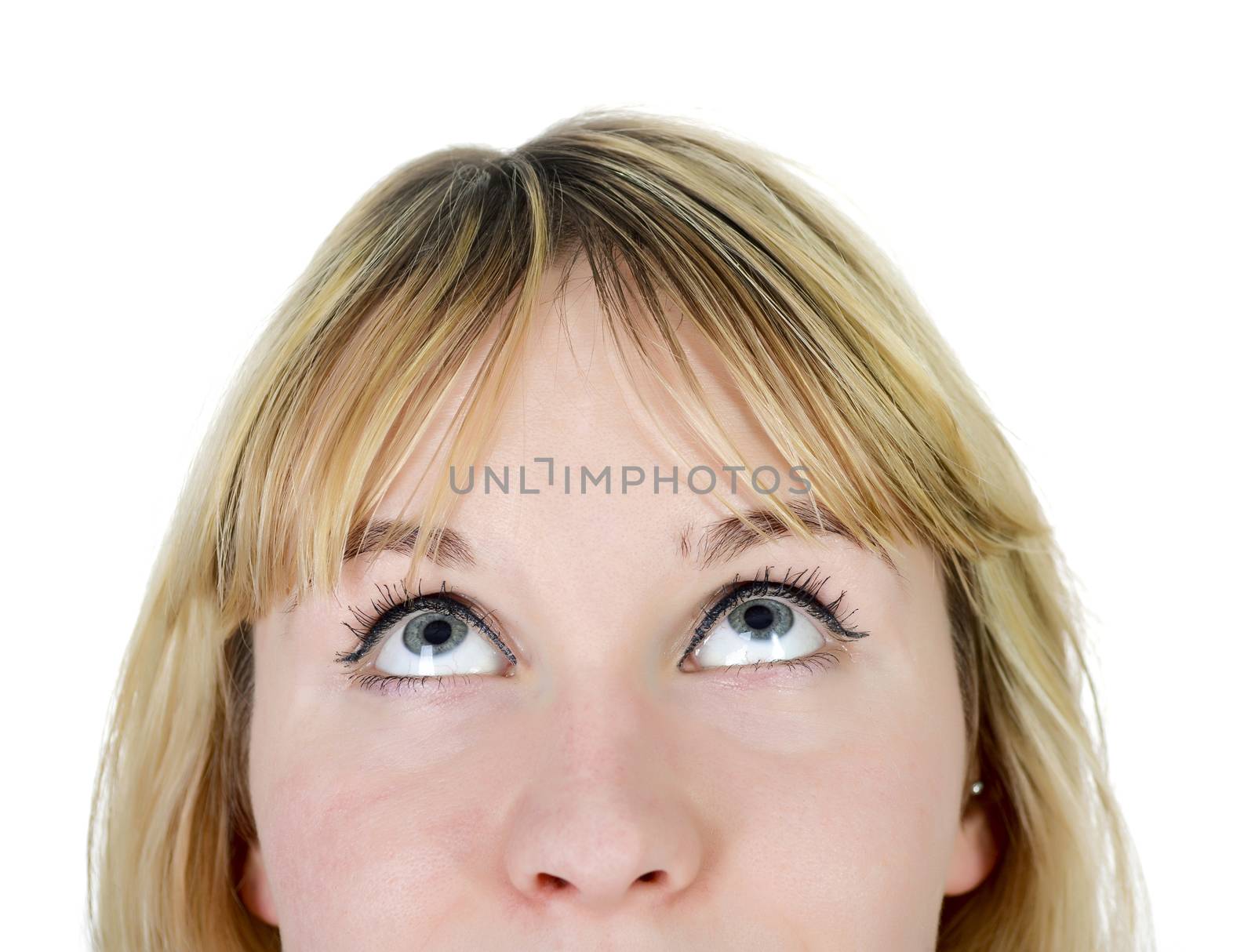 seriously young woman looking up