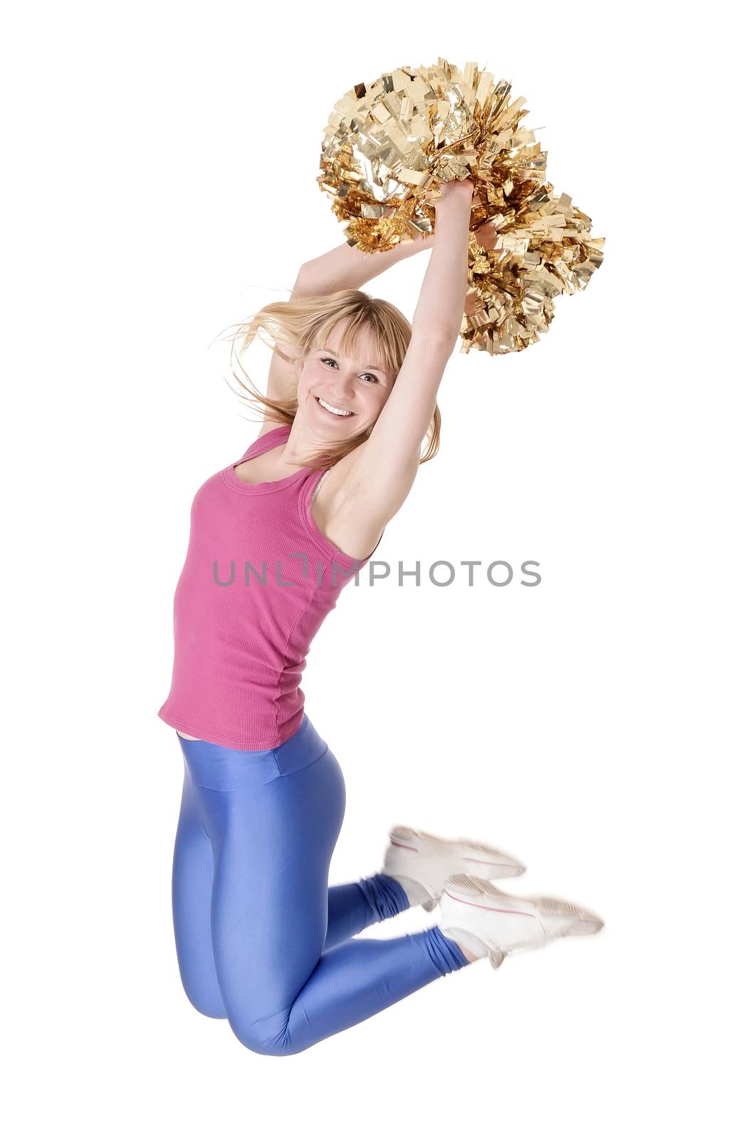 laughing young blond cheerleader jumping