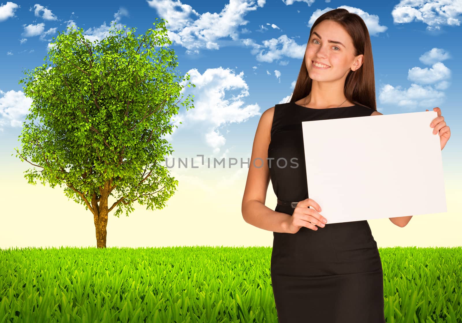 Businesswoman hold white paper. Tree and green landscape as backdrop