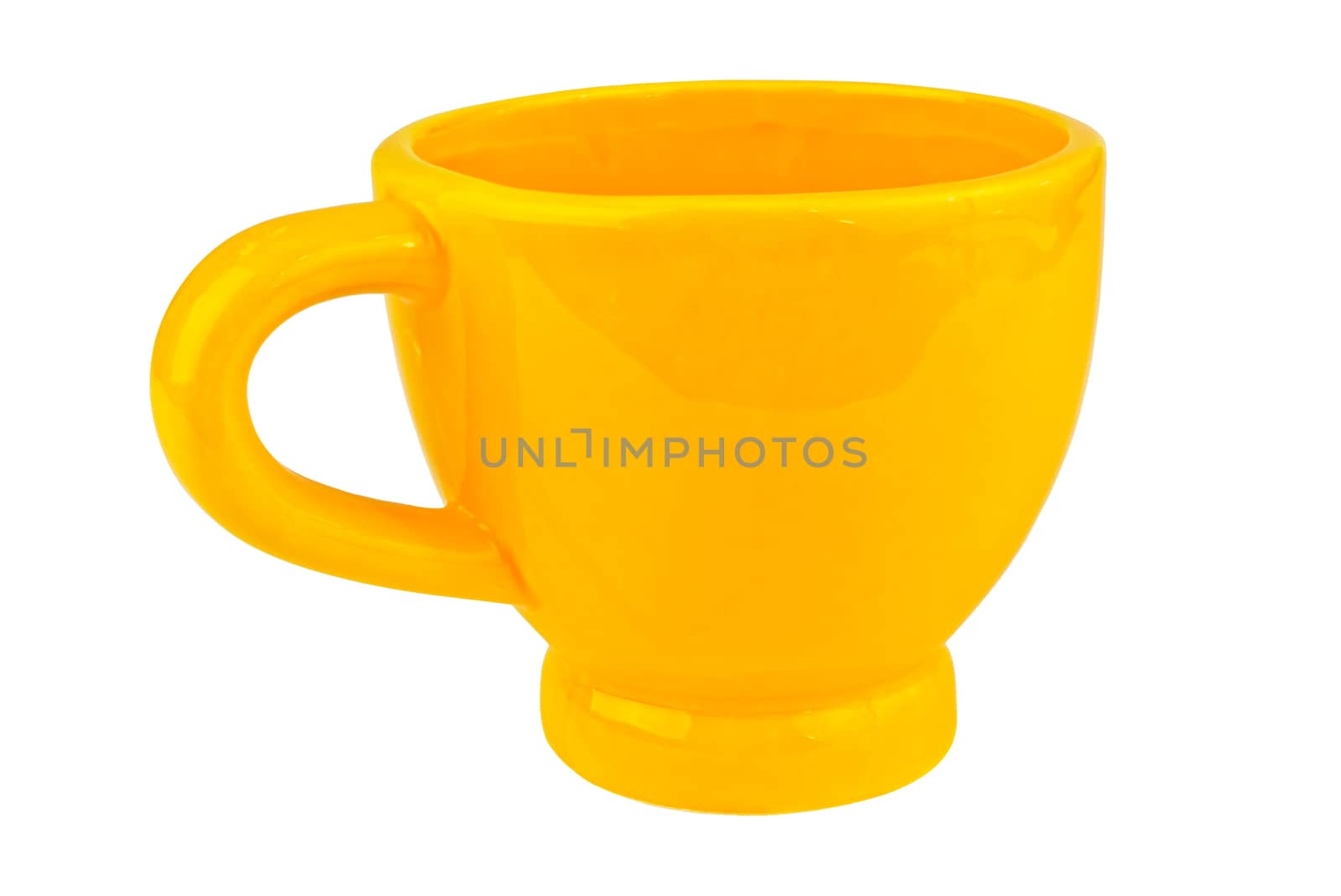 Yellow ceramic cup isolated on white background