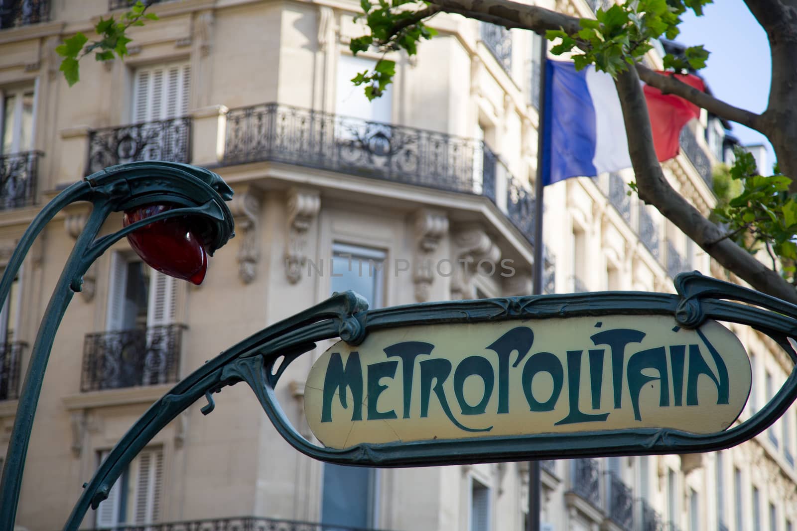 Ancient Metro Sign at the entrance of the Paris Metro