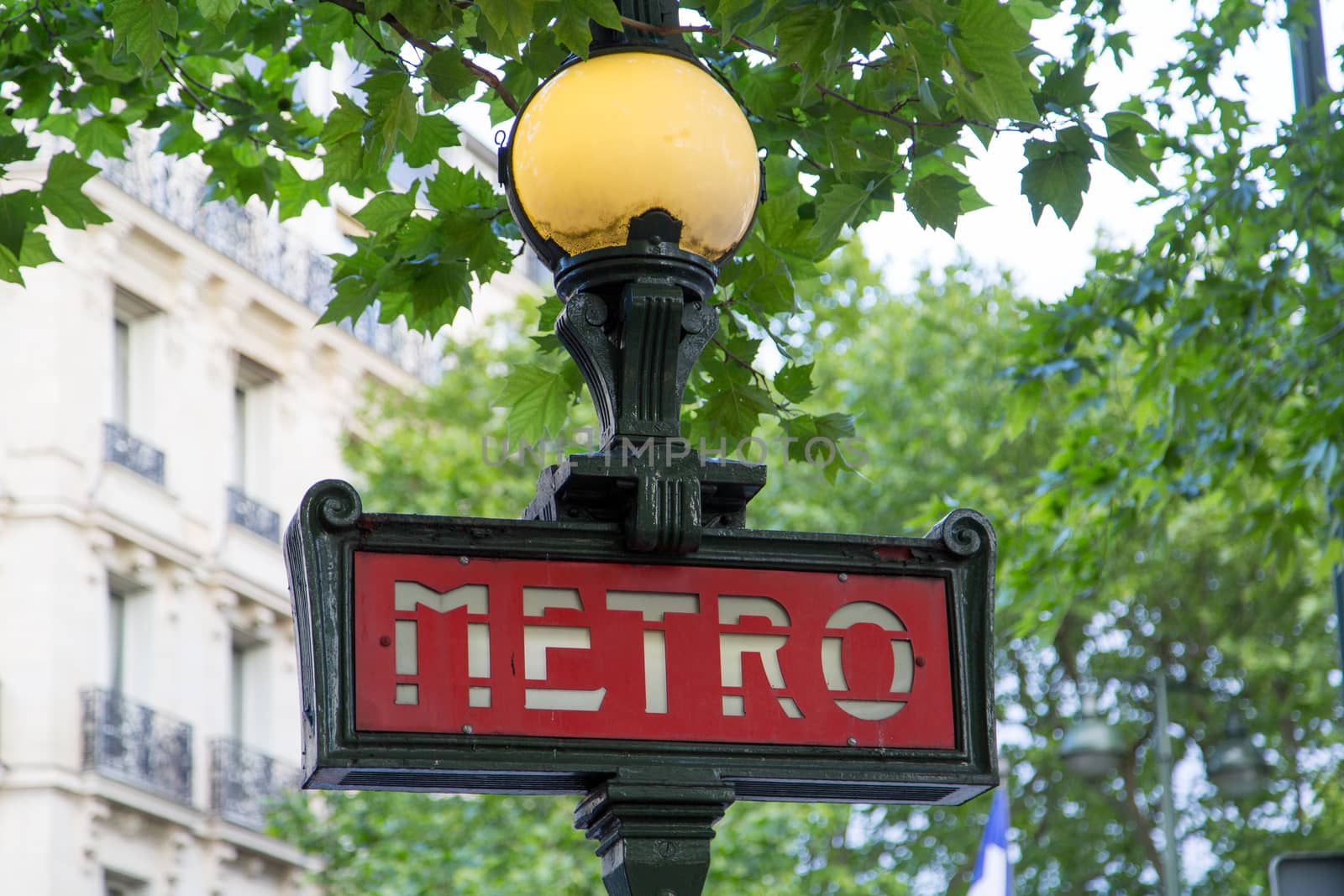 Ancient Metro Sign at the entrance of the Paris Metro
