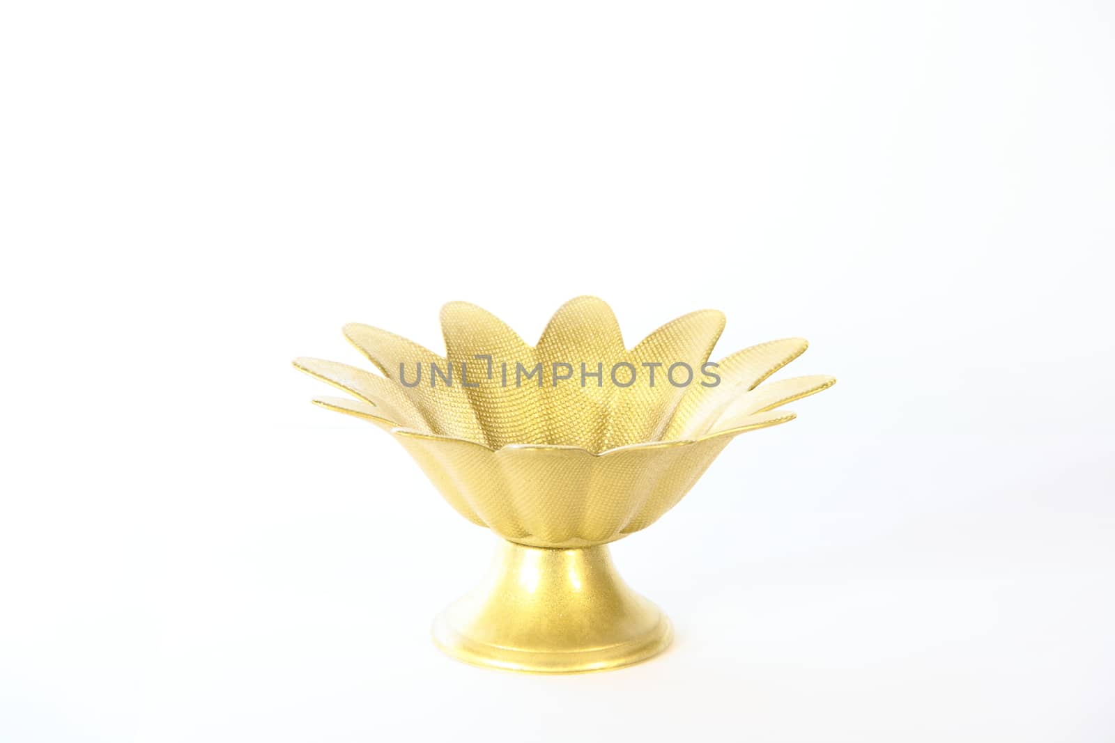 gold case for sweeties on white background