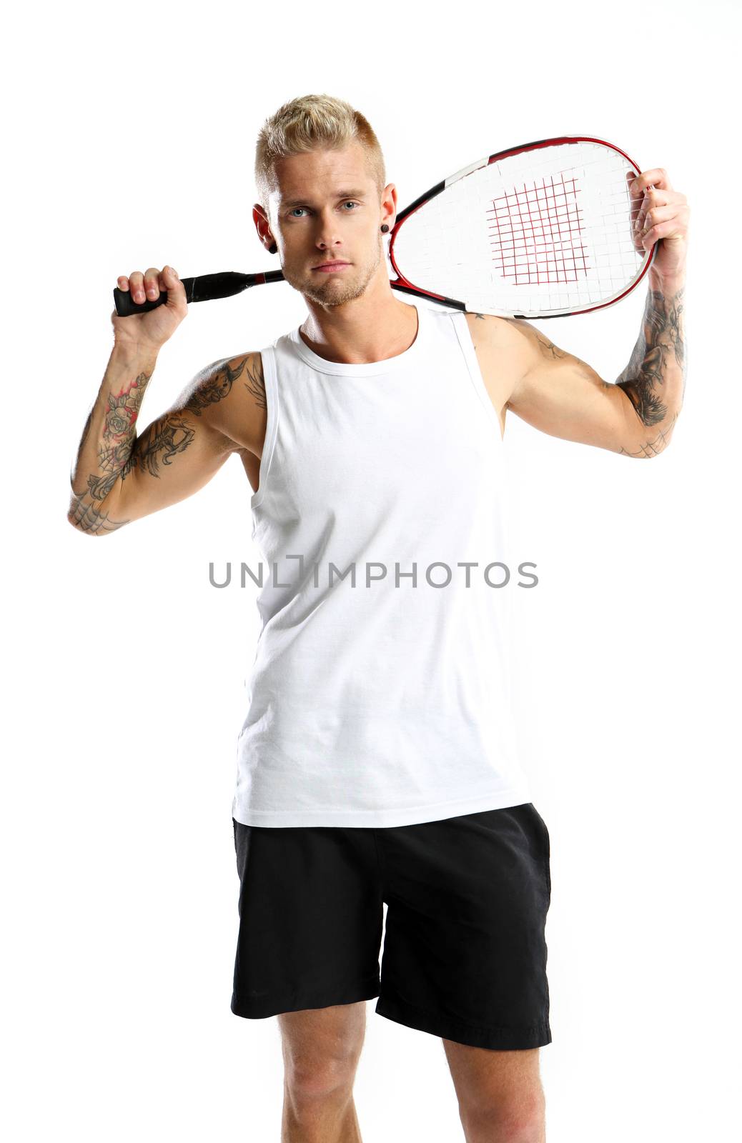 Handsome man with a squash racket