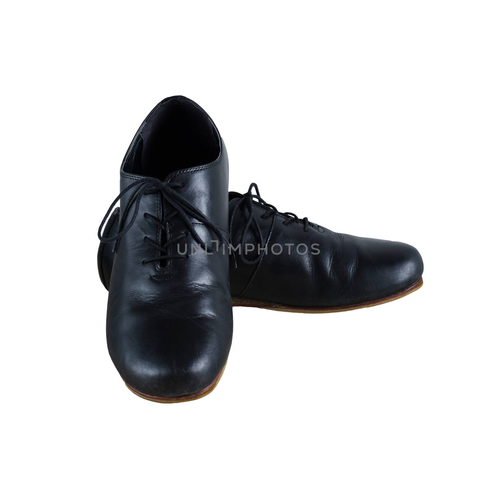 black male leather shoes isolated on white background by siraanamwong