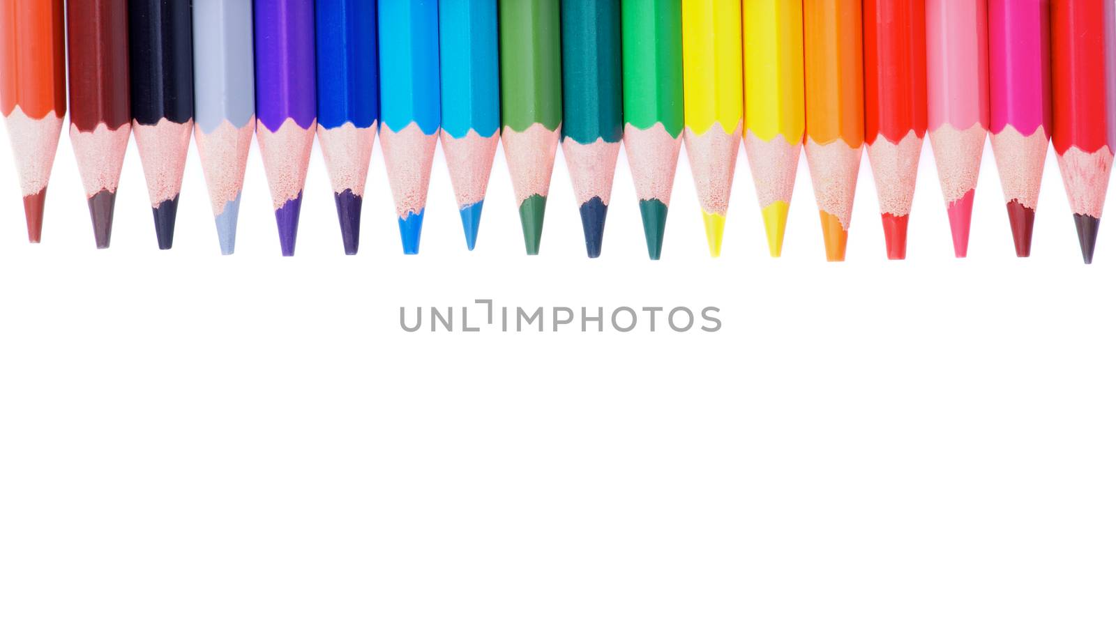 Border of Multicolored Pencils isolated on white background