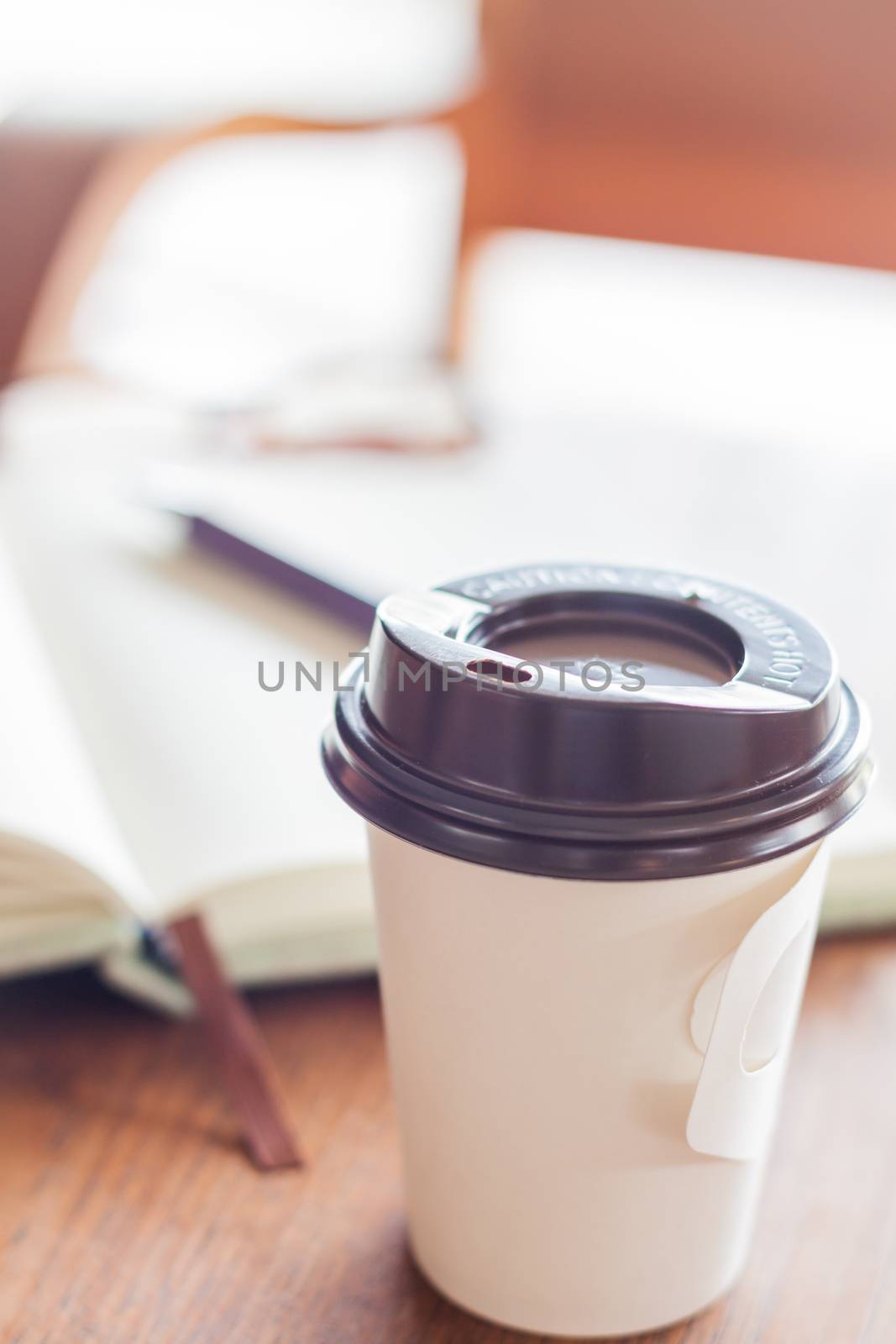 Closed up coffee cup in coffee shop, stock photo