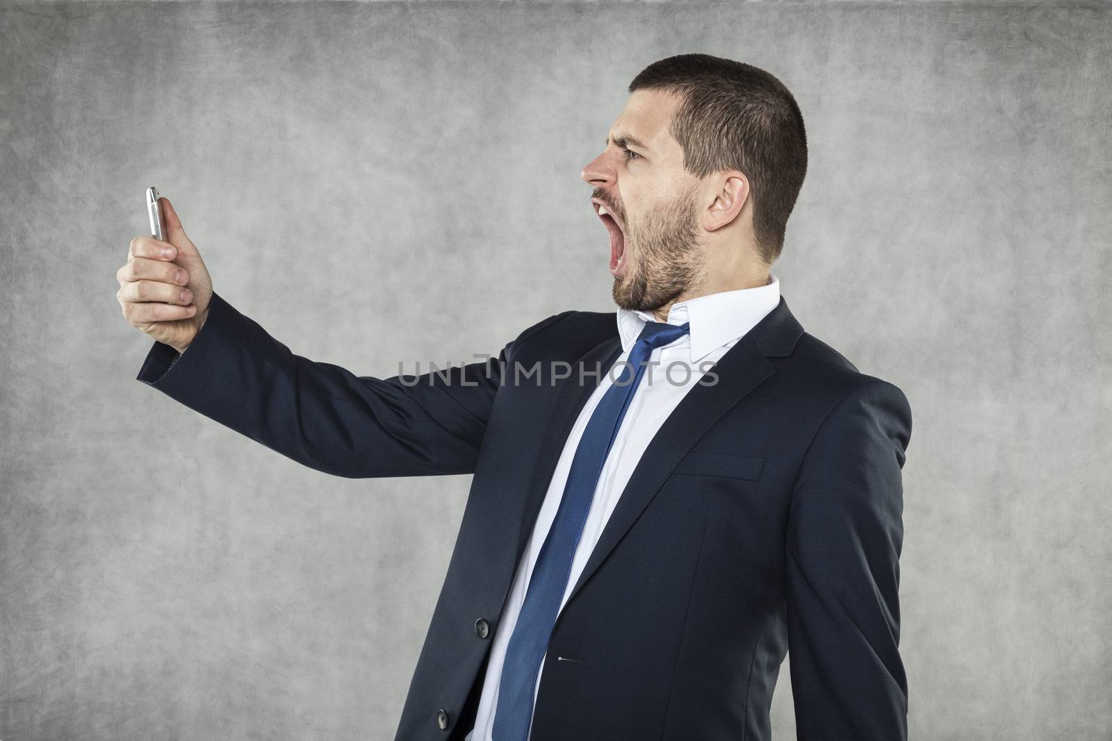 angry businessman shouts