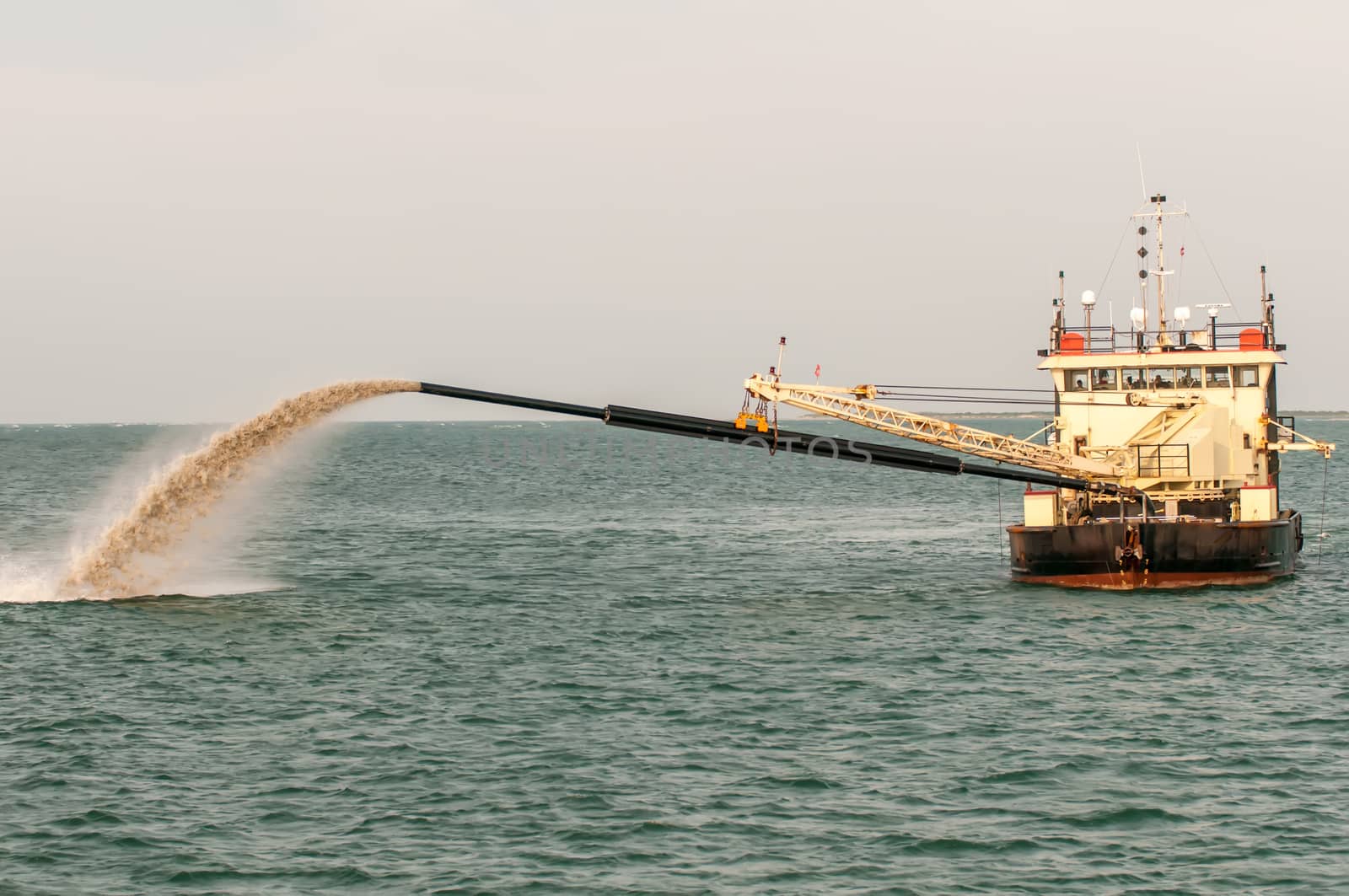 Barge Pipe pushing sand onto the beach