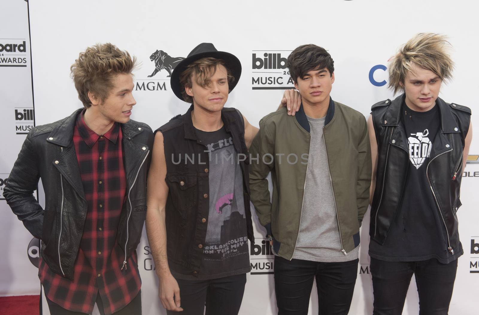 LAS VEGAS - MAY 18 : Members of the pop band 5 Seconds of Summer attend the 2014 Billboard Music Awards at the MGM Grand Garden Arena on May 18 , 2014 in Las Vegas.