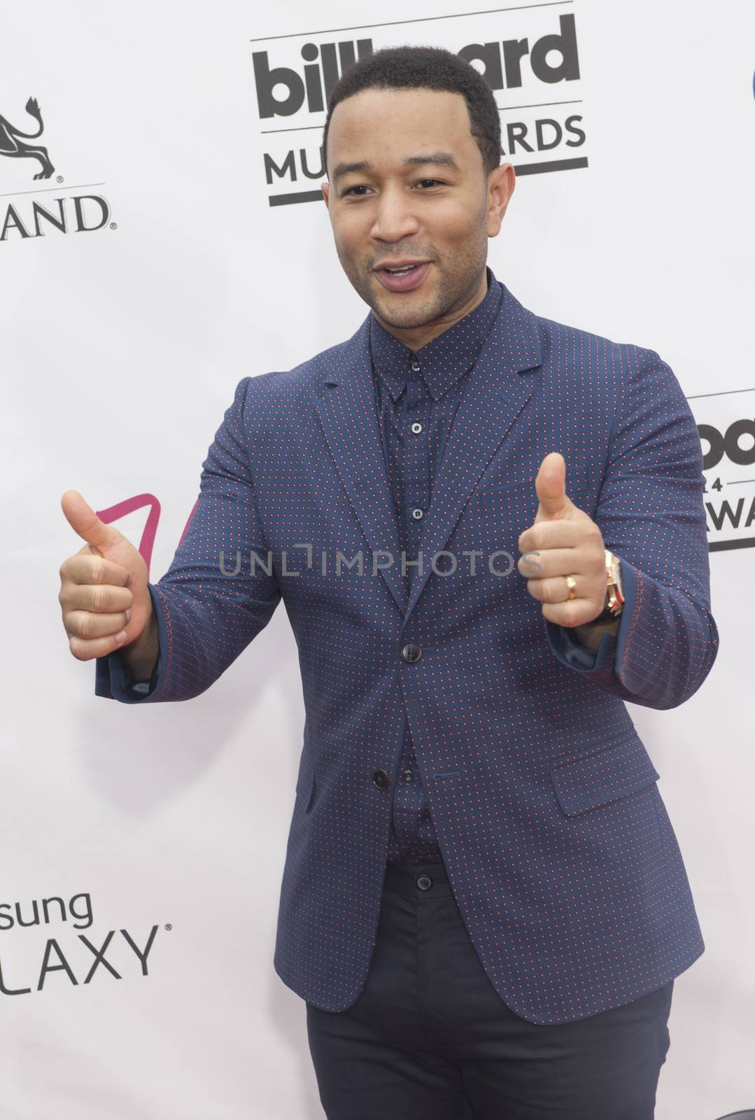 LAS VEGAS - MAY 18 : Singer/songwriter John Legend attend the 2014 Billboard Music Awards at the MGM Grand Garden Arena on May 18 , 2014 in Las Vegas.