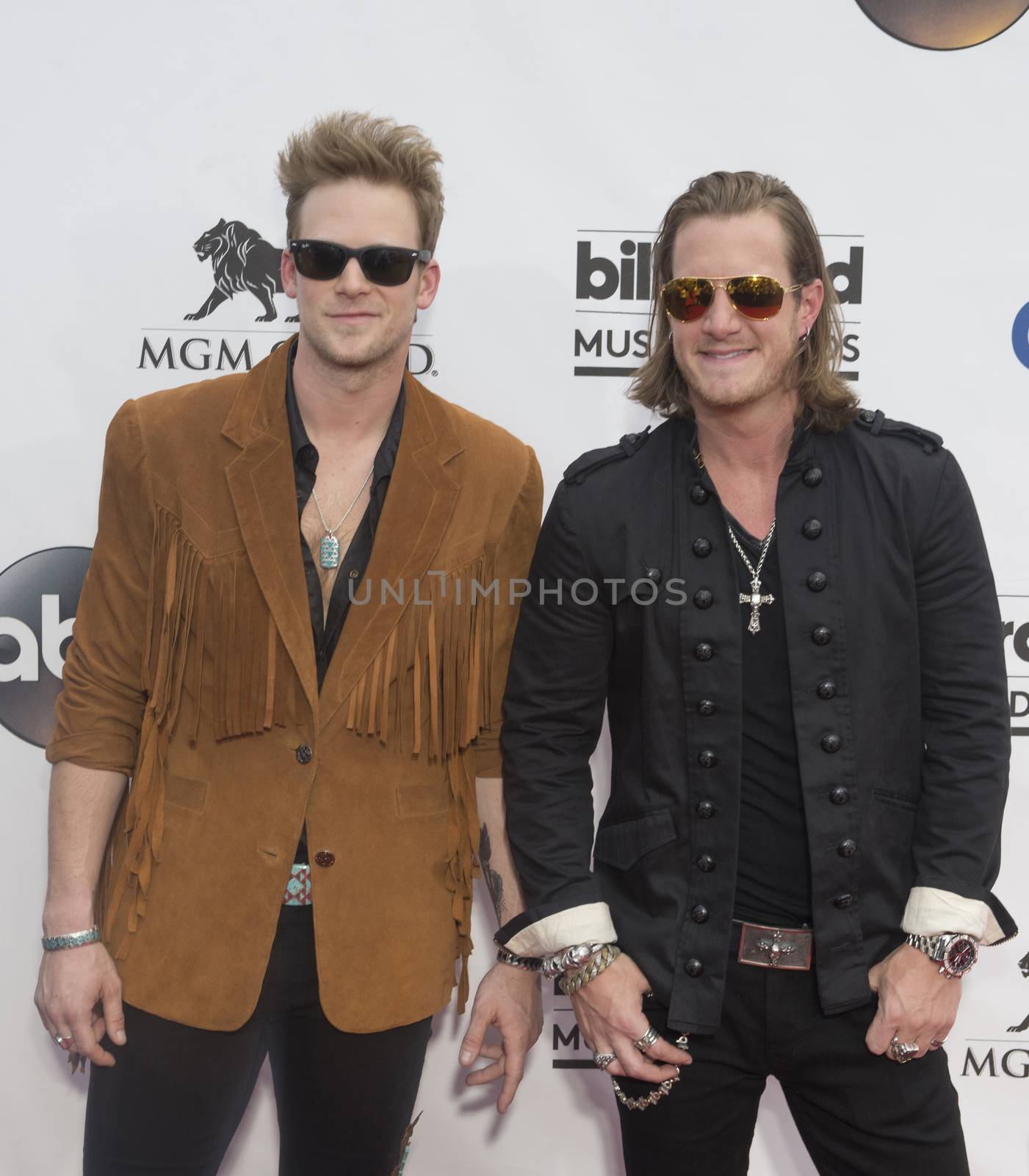 LAS VEGAS - MAY 18 : Florida Georgia Line members Brian Kelley (L) and Tyler Hubbard attend the 2014 Billboard Music Awards at the MGM Grand Garden Arena on May 18 , 2014 in Las Vegas.