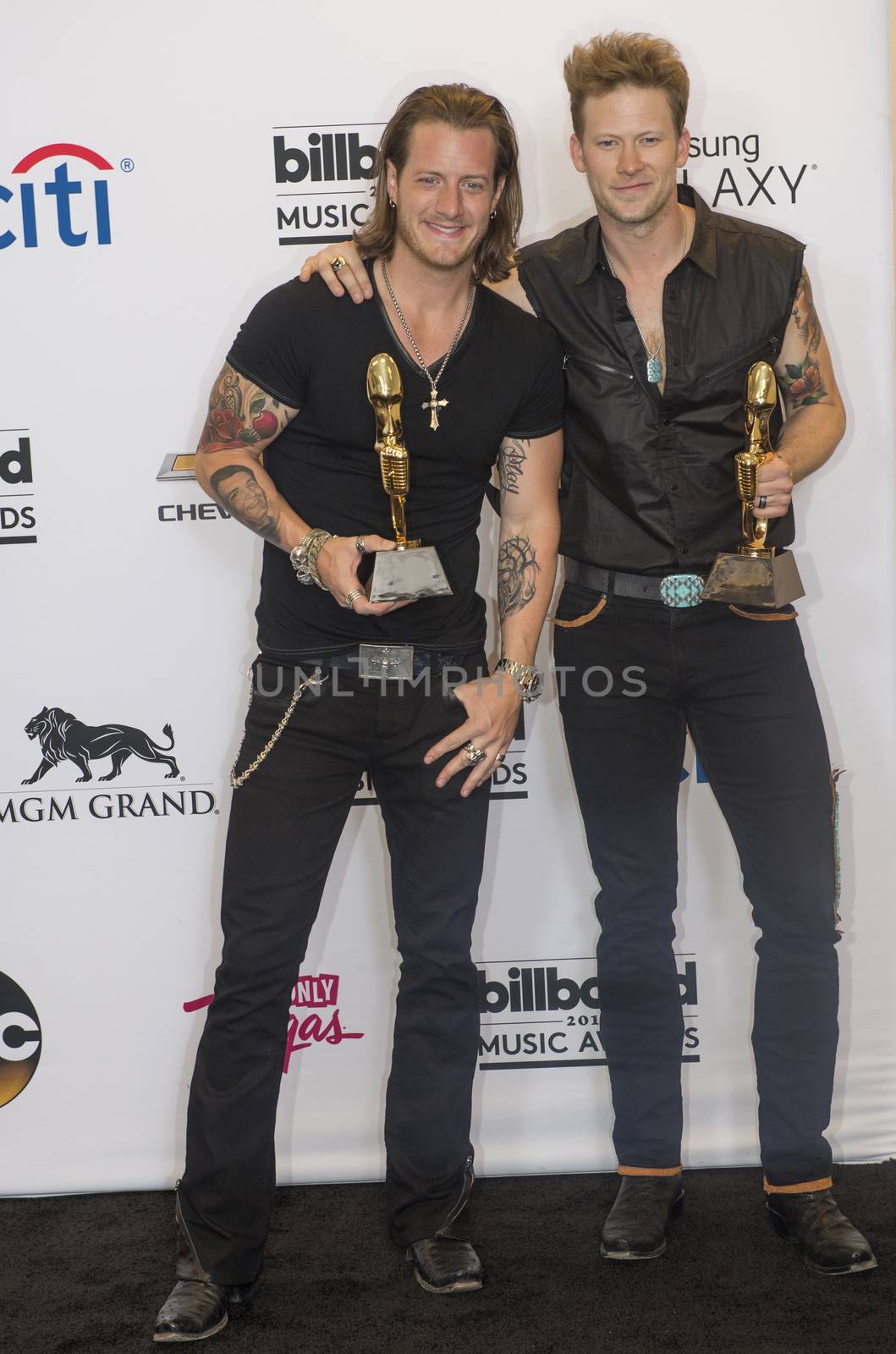 LAS VEGAS - MAY 18 : Florida Georgia Line members Tyler Hubbard and Brian Kelley attend the 2014 Billboard Music Awards press room at the MGM Grand Garden Arena on May 18 , 2014 in Las Vegas.