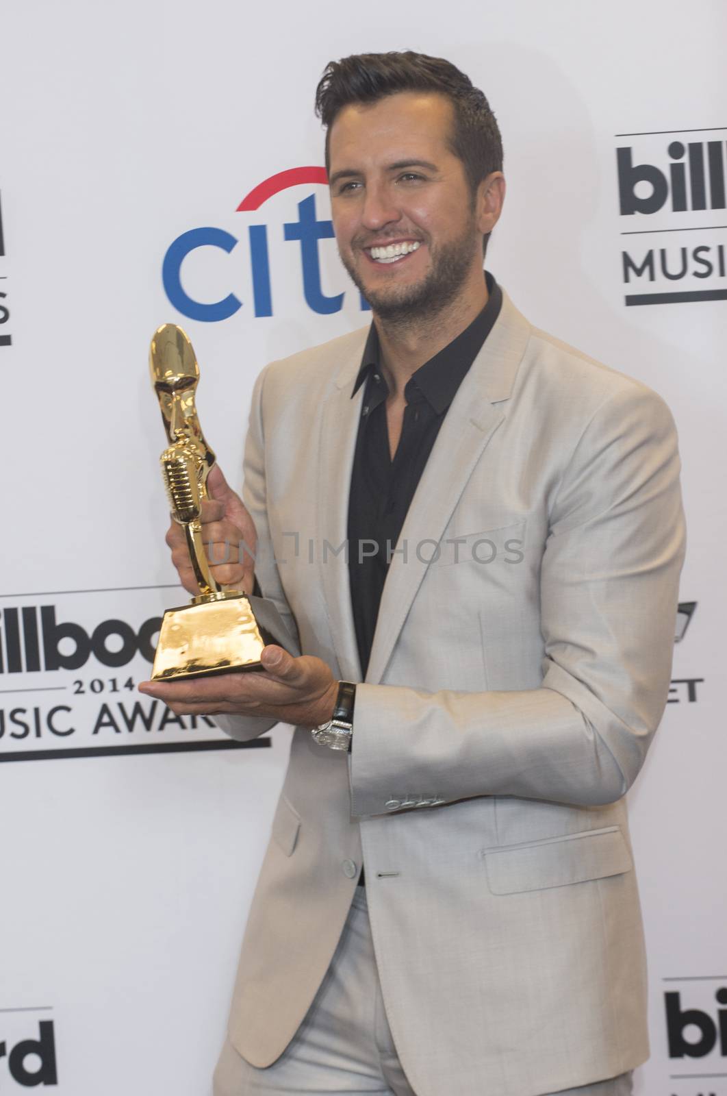 LAS VEGAS - MAY 18 : Recording artist Luke Bryan attends the 2014 Billboard Music Awards press room at the MGM Grand Garden Arena on May 18 , 2014 in Las Vegas.