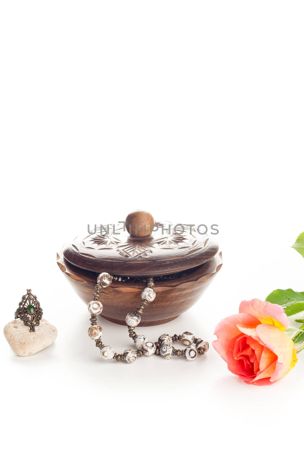 vintage necklace and ring with wooden jewelry box and rose
