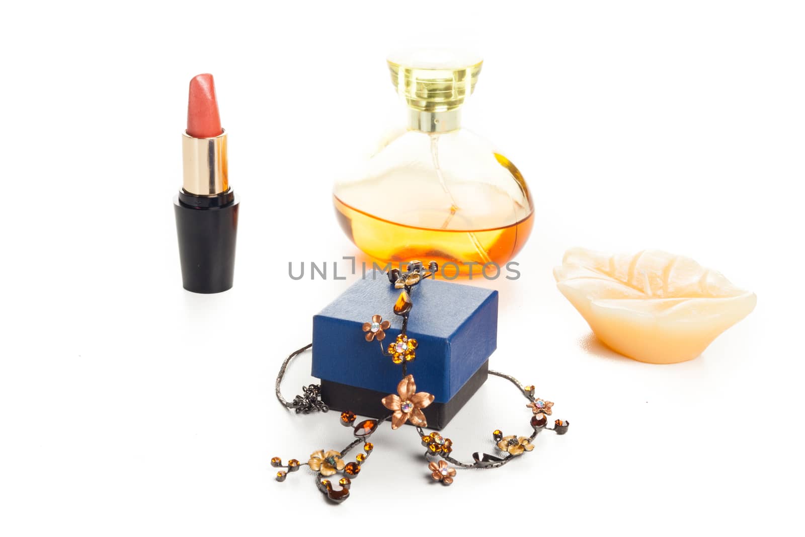 fashion necklace with box, perfume bottle and red lipstick