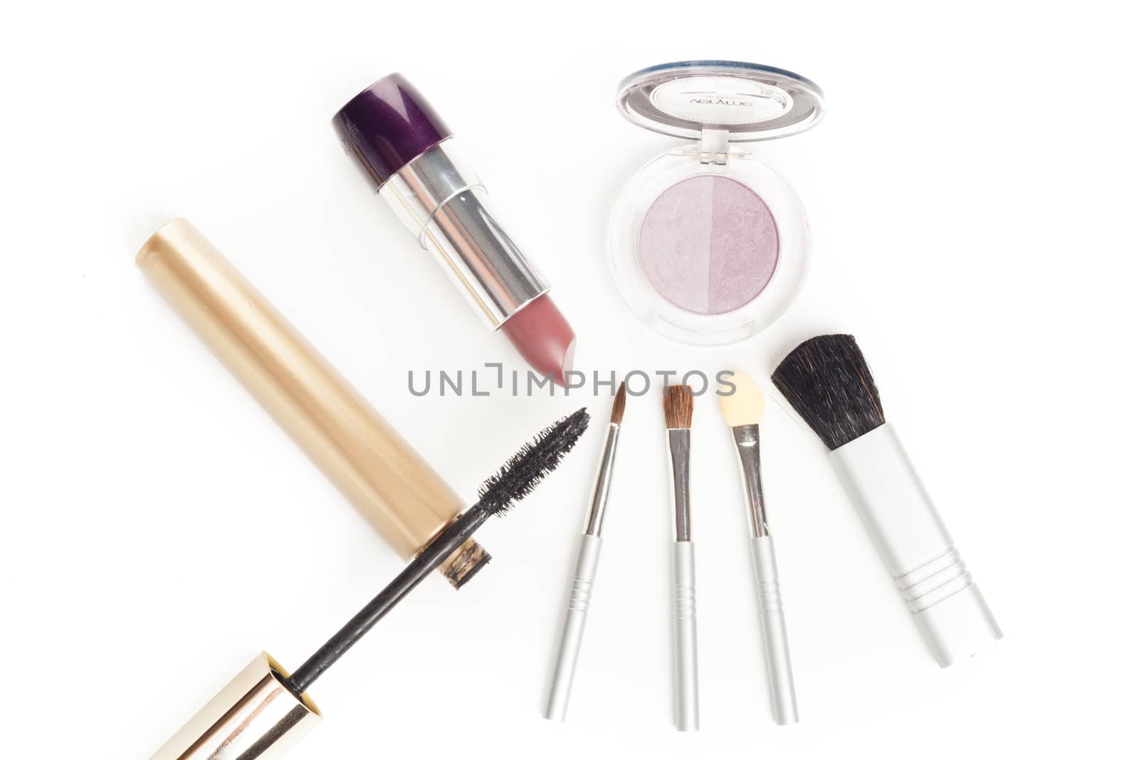 simple facial cosmetics set with lipstick brushes mascara