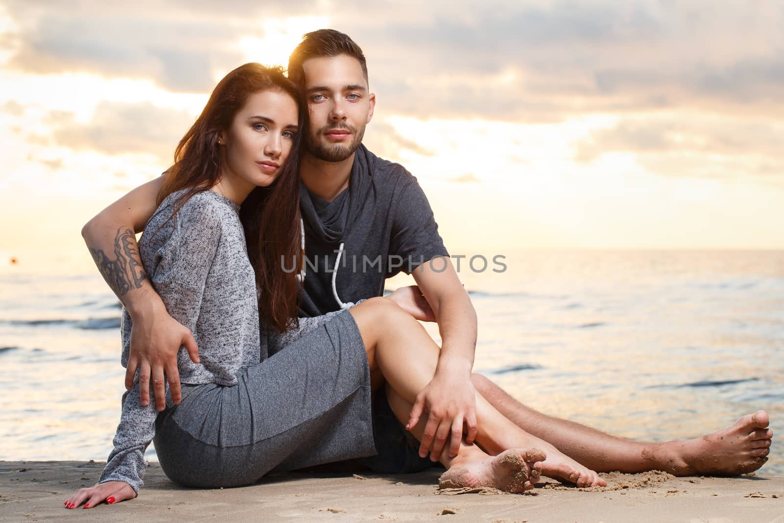 Beautiful couple on the beach by rufatjumali