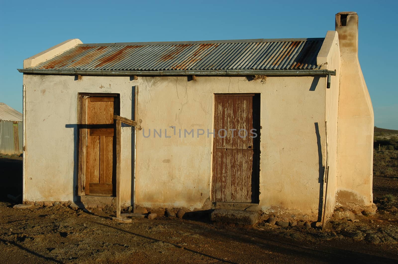 Decaying architecture at sunset on a farm in the Northern Cape Province of South Africa

