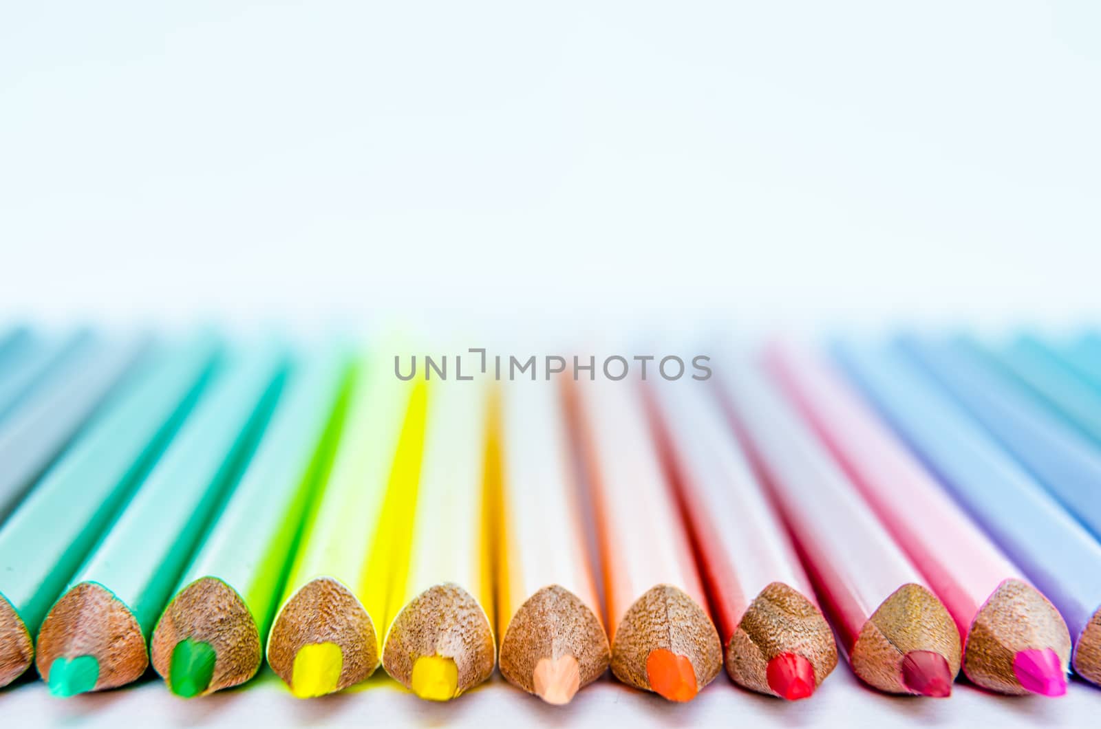 Close up detail of colorful pencils with white background by martinm303