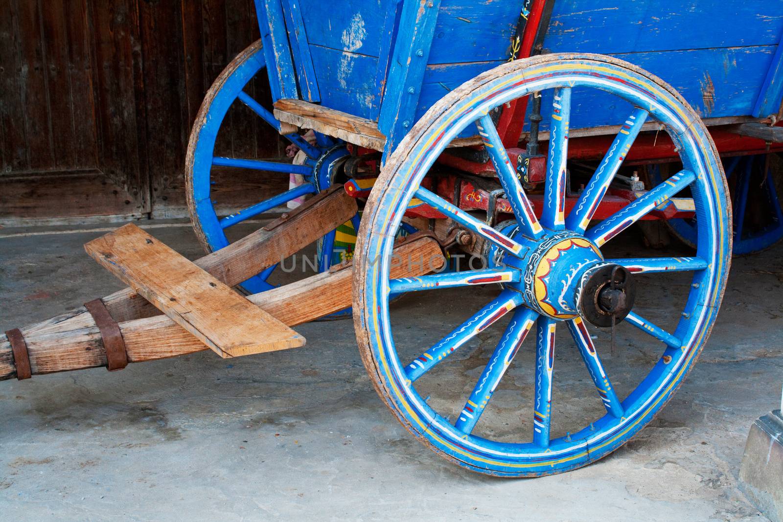 Wagon wheel . Close-Up of an antique wagon wheel located in a fortress.