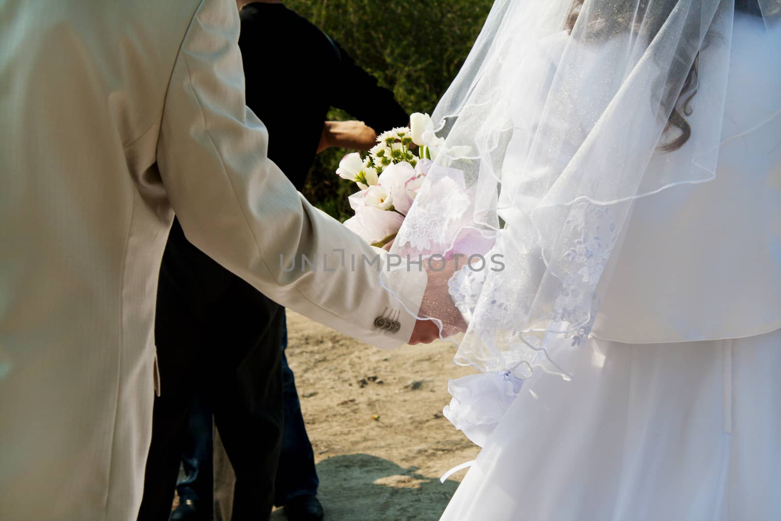 Bride and groom on their wedding day by maggee