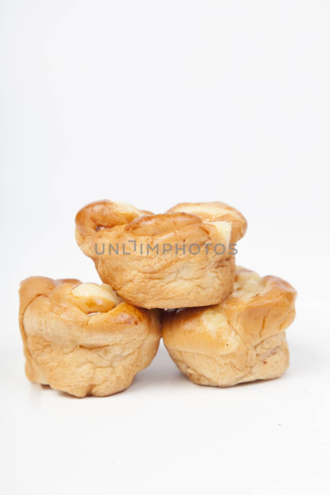 Three bread slices isolated on white background. Breads are stacked together.