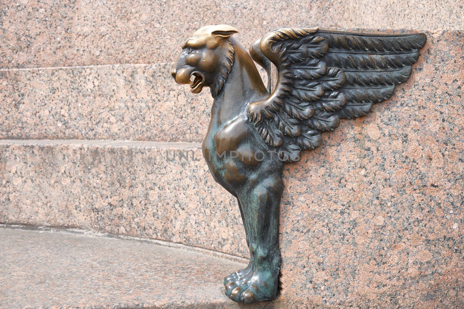 Sculpture of griffin on embankment of the Neva river in the city St Petersburg, Russia,