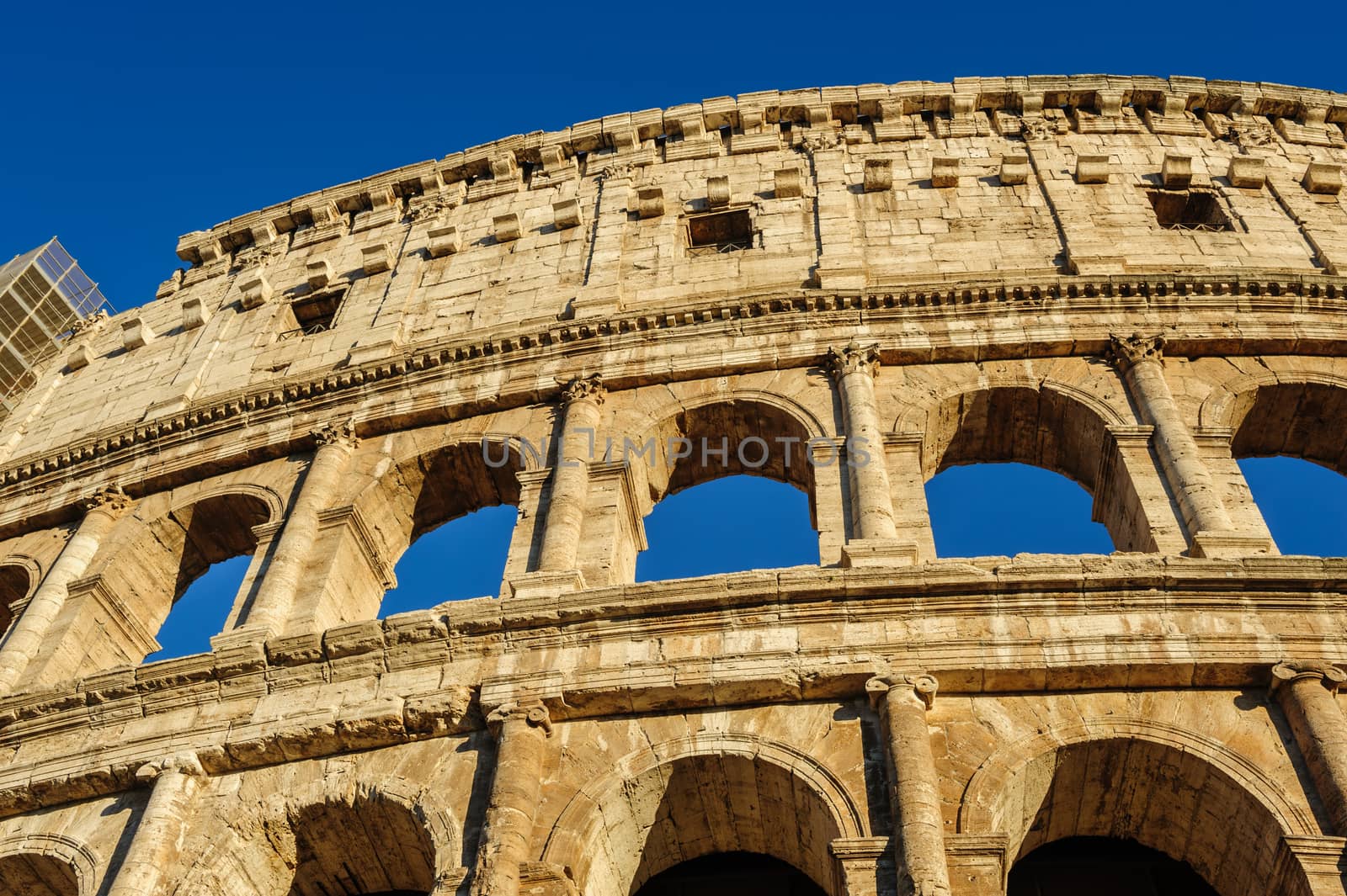 Partial view of ancient Rome Coliseum ruins. Italy, Rome.