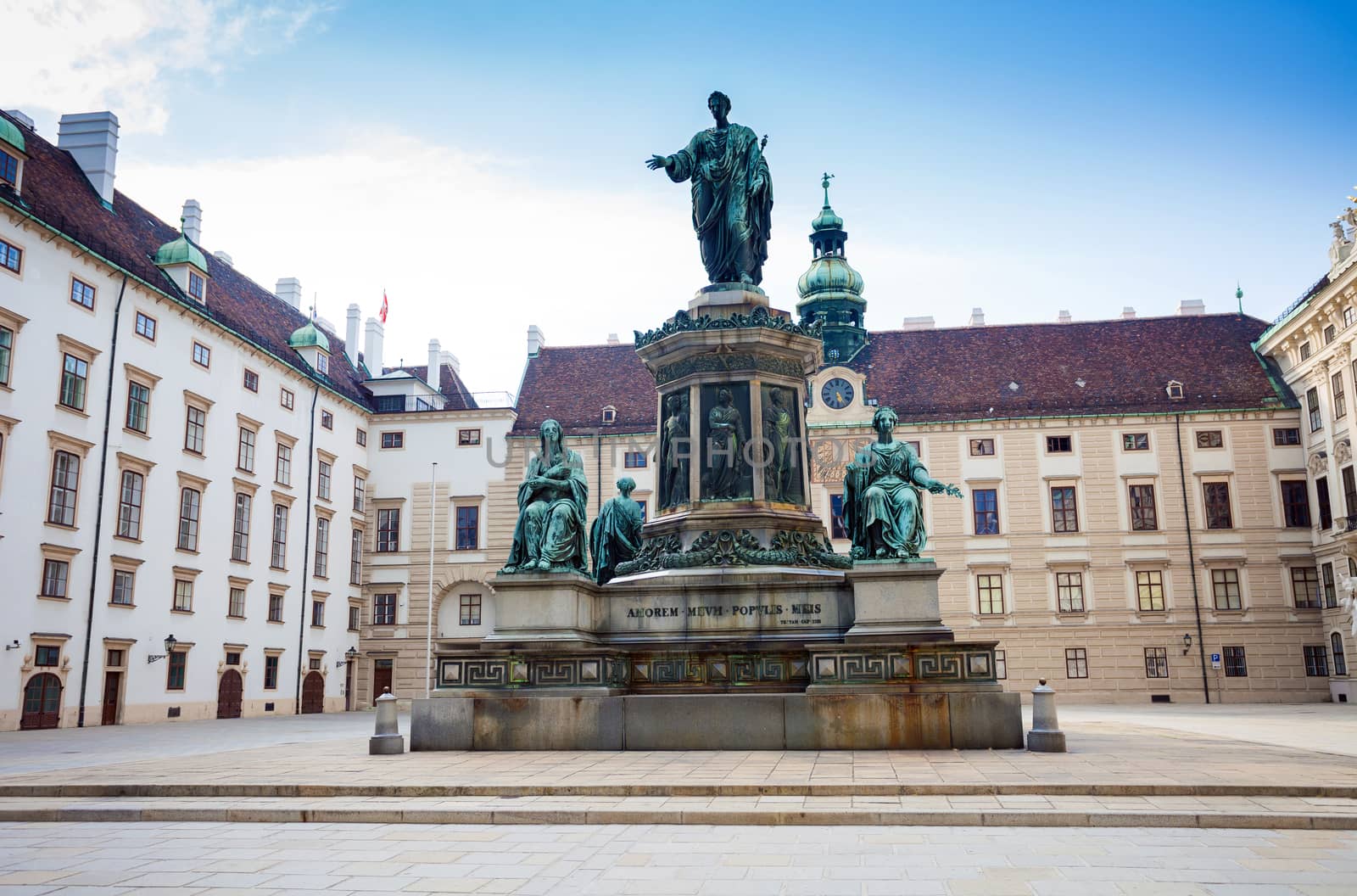 VIENNA, AUSTRIA - AUGUST 4, 2013: Hofburg Palace courtyard with Emperor Franz I sculpture monument, Vienna, Austria.
