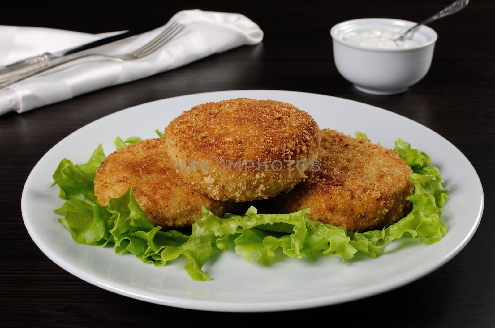 Chicken cutlet breaded in lettuce leaves