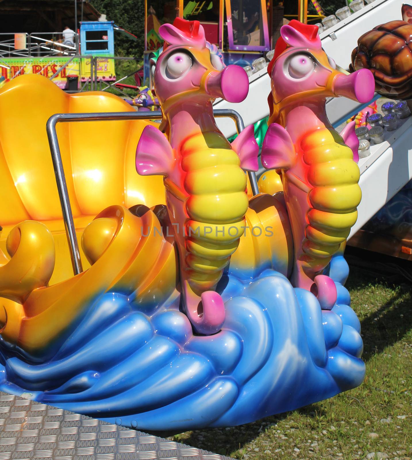 Close up shot of the seahorse in a merry-go-round theme park.