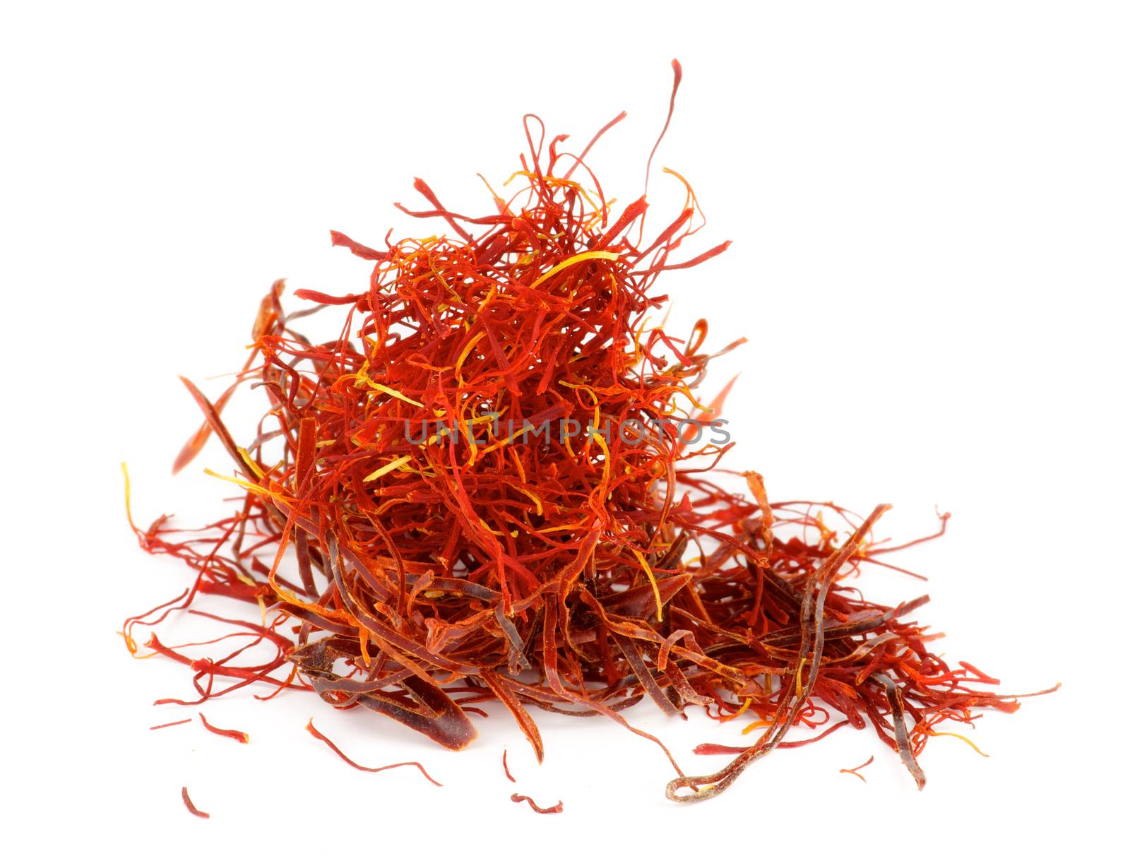 Stack of Perfect Red Dry Saffron isolated on white background