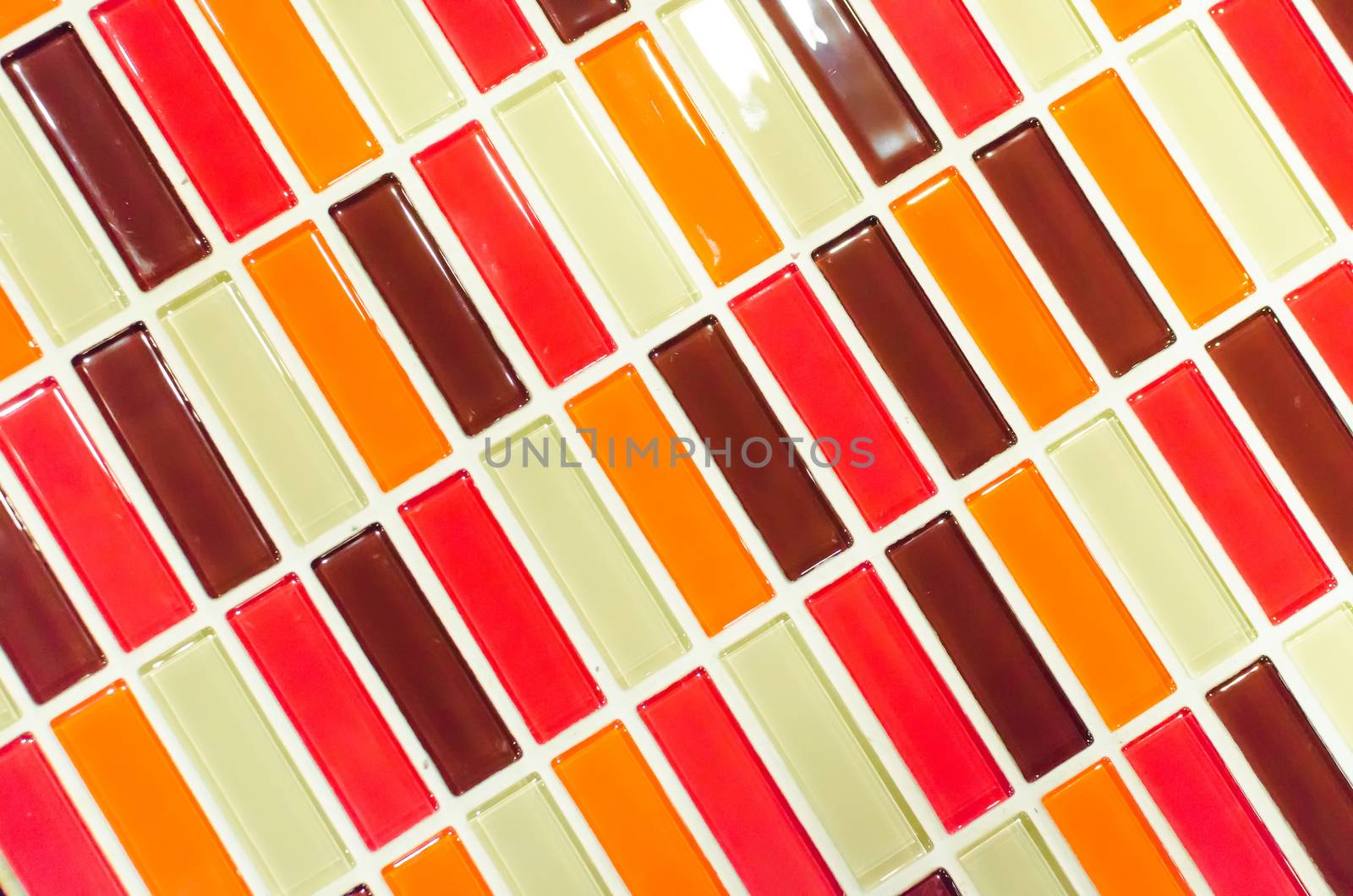 Lime red yellow and brown mosaic tiles background by nopparats