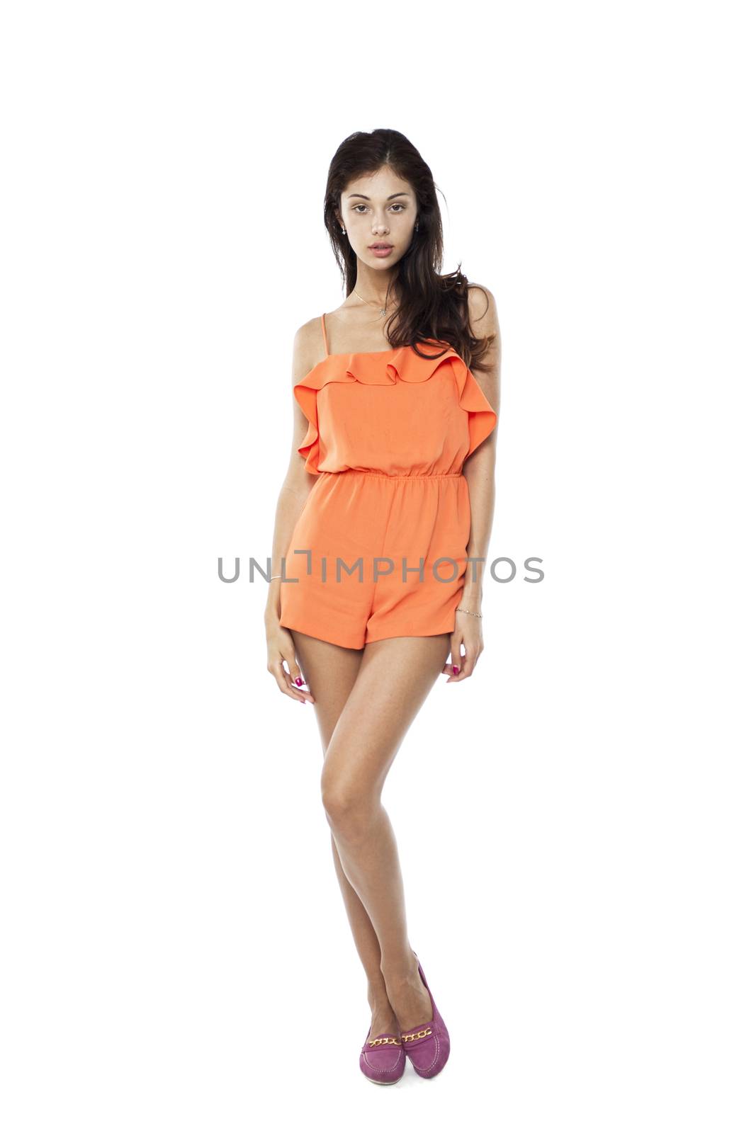 Portrait of sexy woman in orange dress, isolated on white
