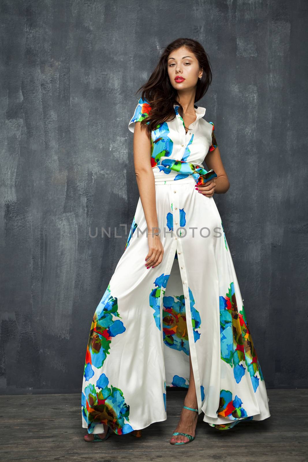 Glamour Portrait of young woman in white summer dress