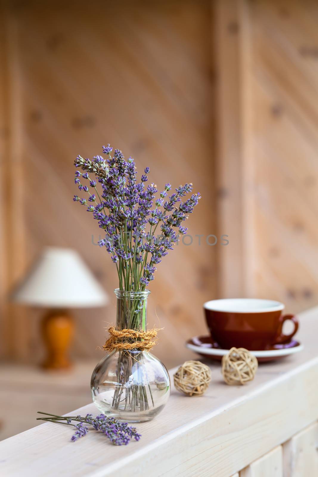 Beautiful lavender bunch in rustic home style setting by motorolka