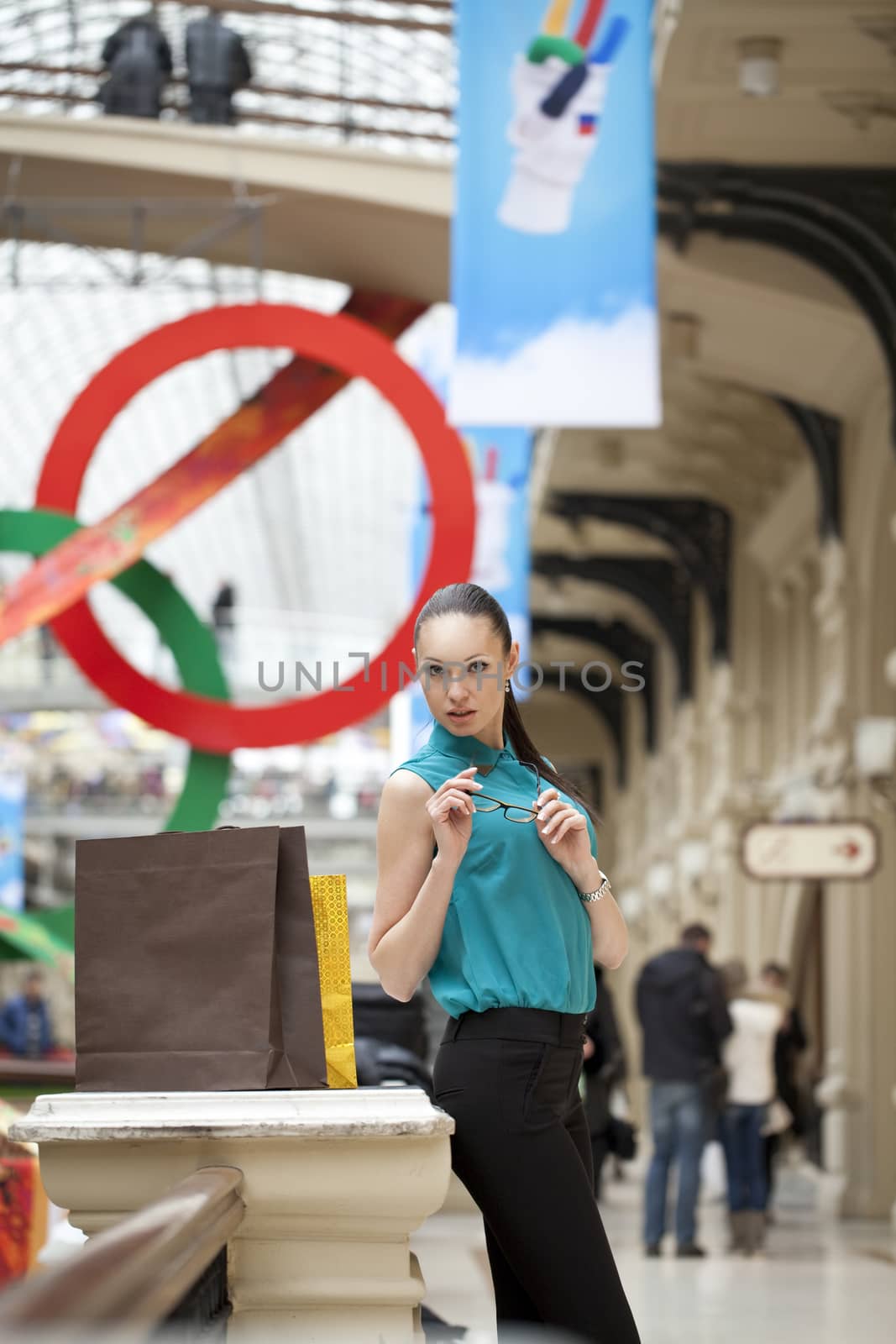 Beautiful young business woman in the store