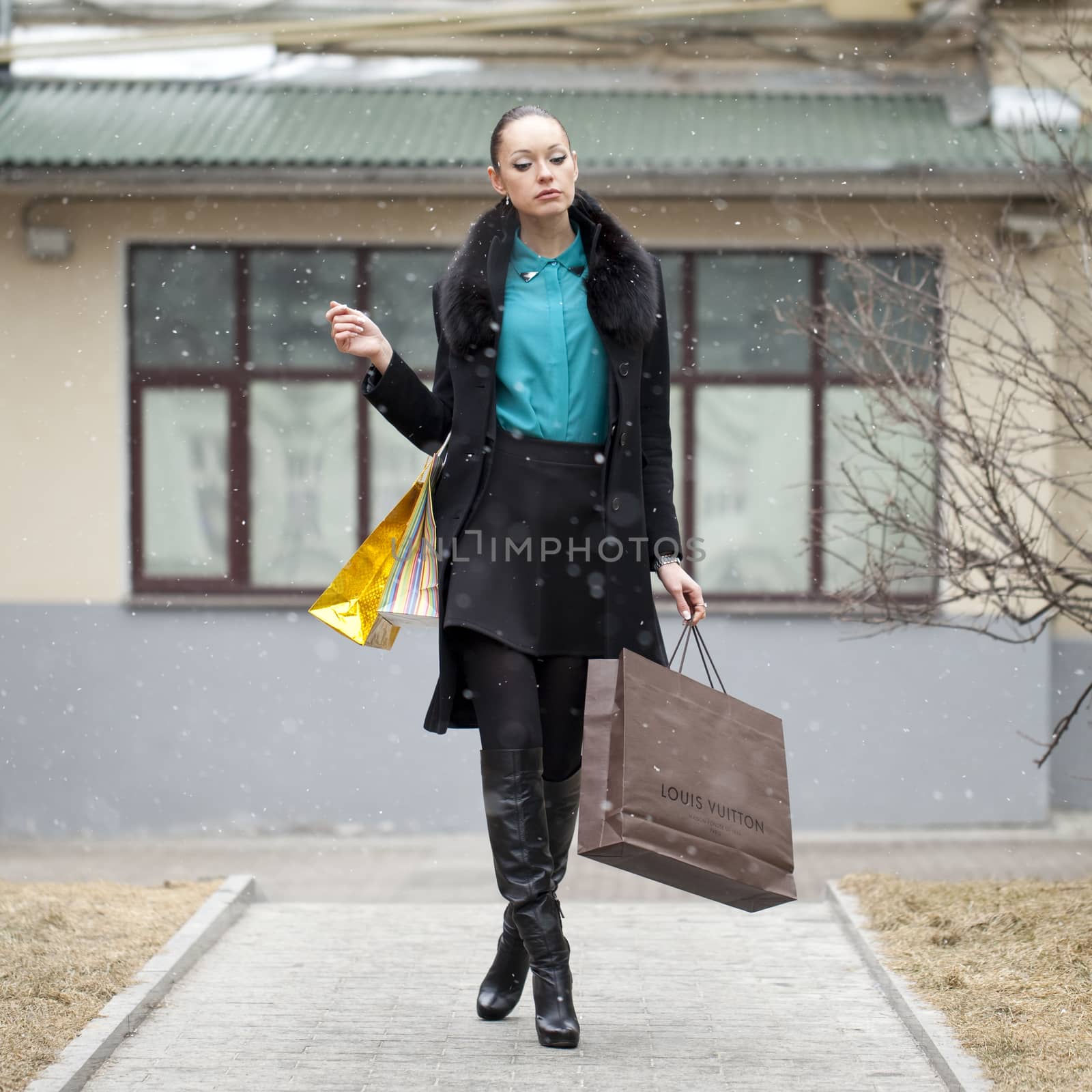 Young beautiful woman in winter day