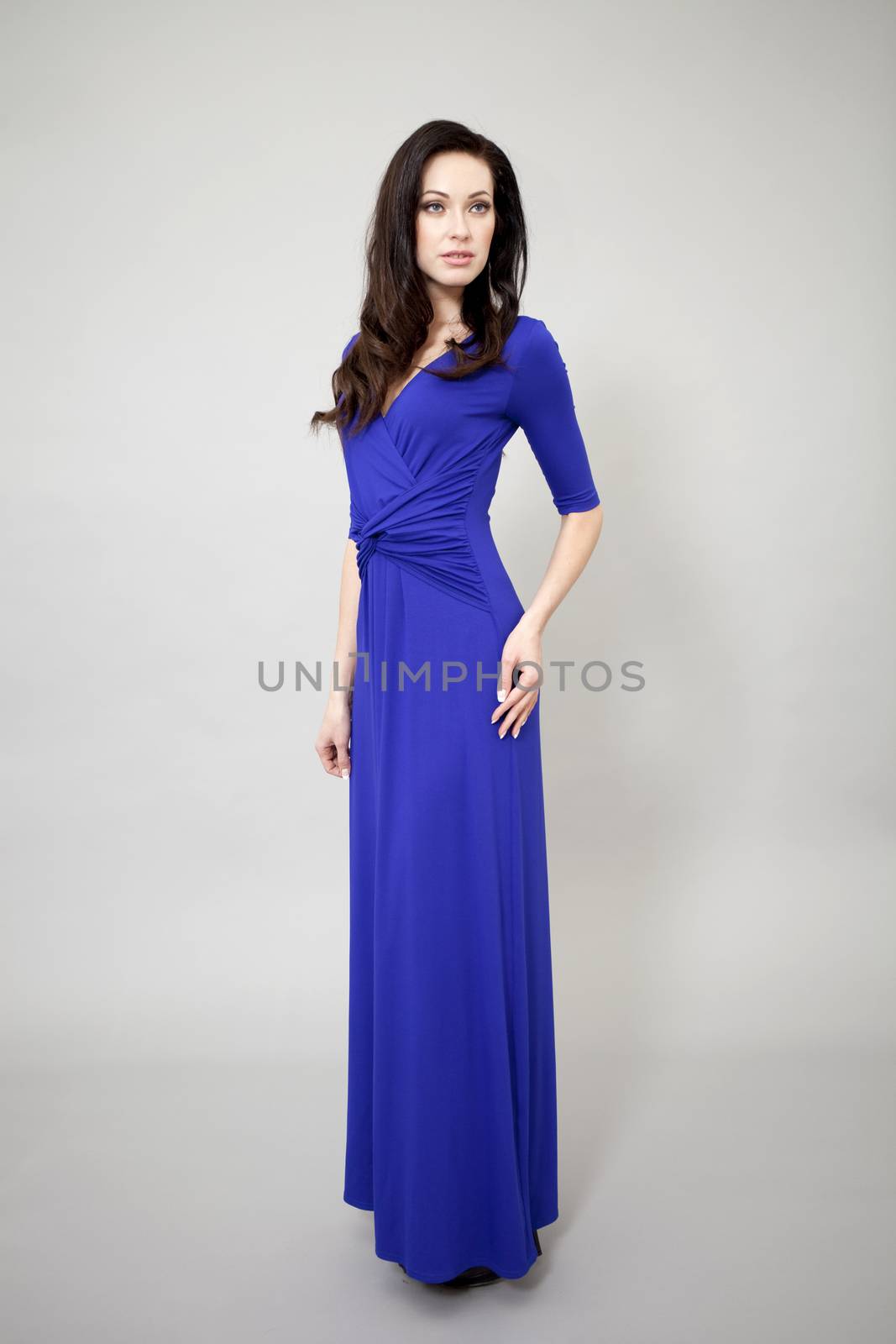 Fashion model in long blue dress by andersonrise