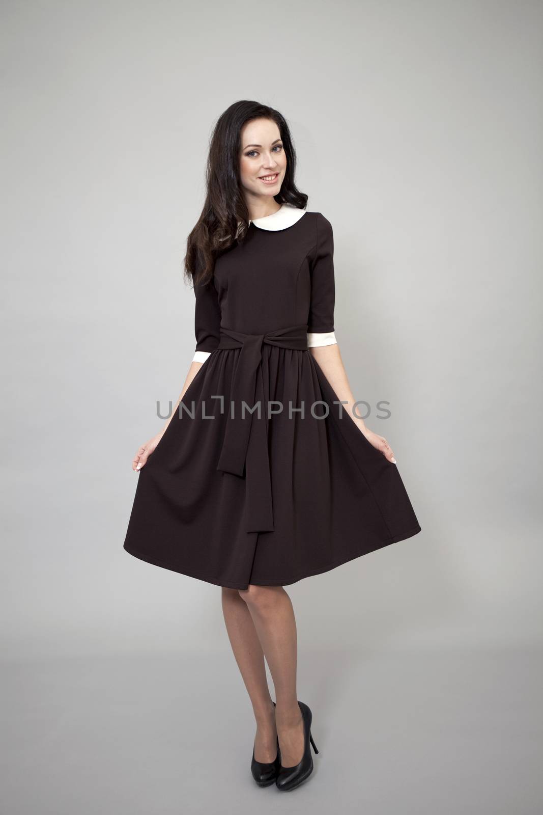 Beautiful professional model in dark brown dress by andersonrise