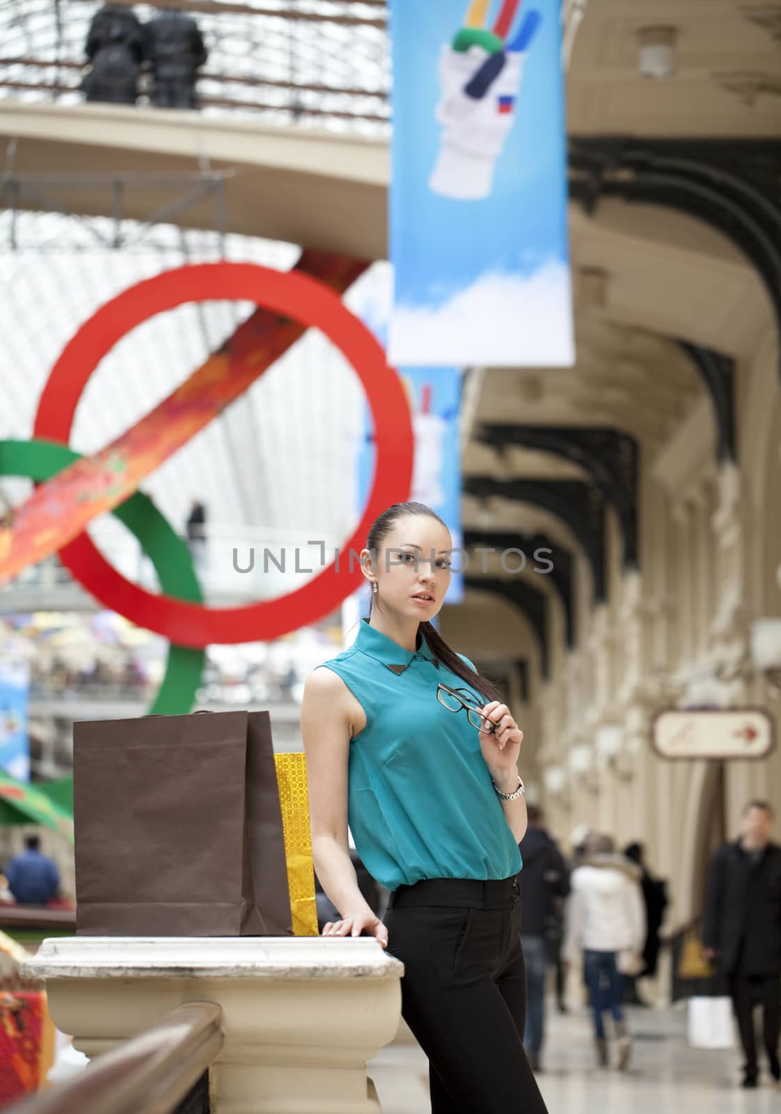 Beautiful young business woman in the store