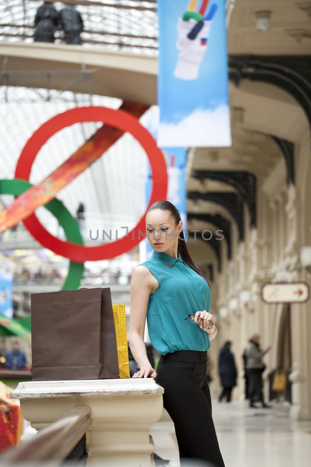 Beautiful young business woman in the store